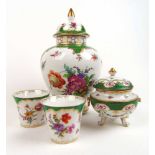 Four items of Dresden ceramics decorated with flowers on white ground with green and gilt edges,