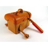 A Danny Morrell 'Toysmith' automaton modelled as a loaf of bread with mice escaping when cut with