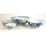 Four 18th century Worcester blue and white bowls decorated in floral and landscape themes, dia. 22.5