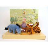 Steiff - a boxed Winnie The Pooh Miniature Set featuring Eeyore, Piglet and Tigger, limited