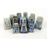 A collection of twelve 19th and early 20th century Chinese incense holders with a tapering body