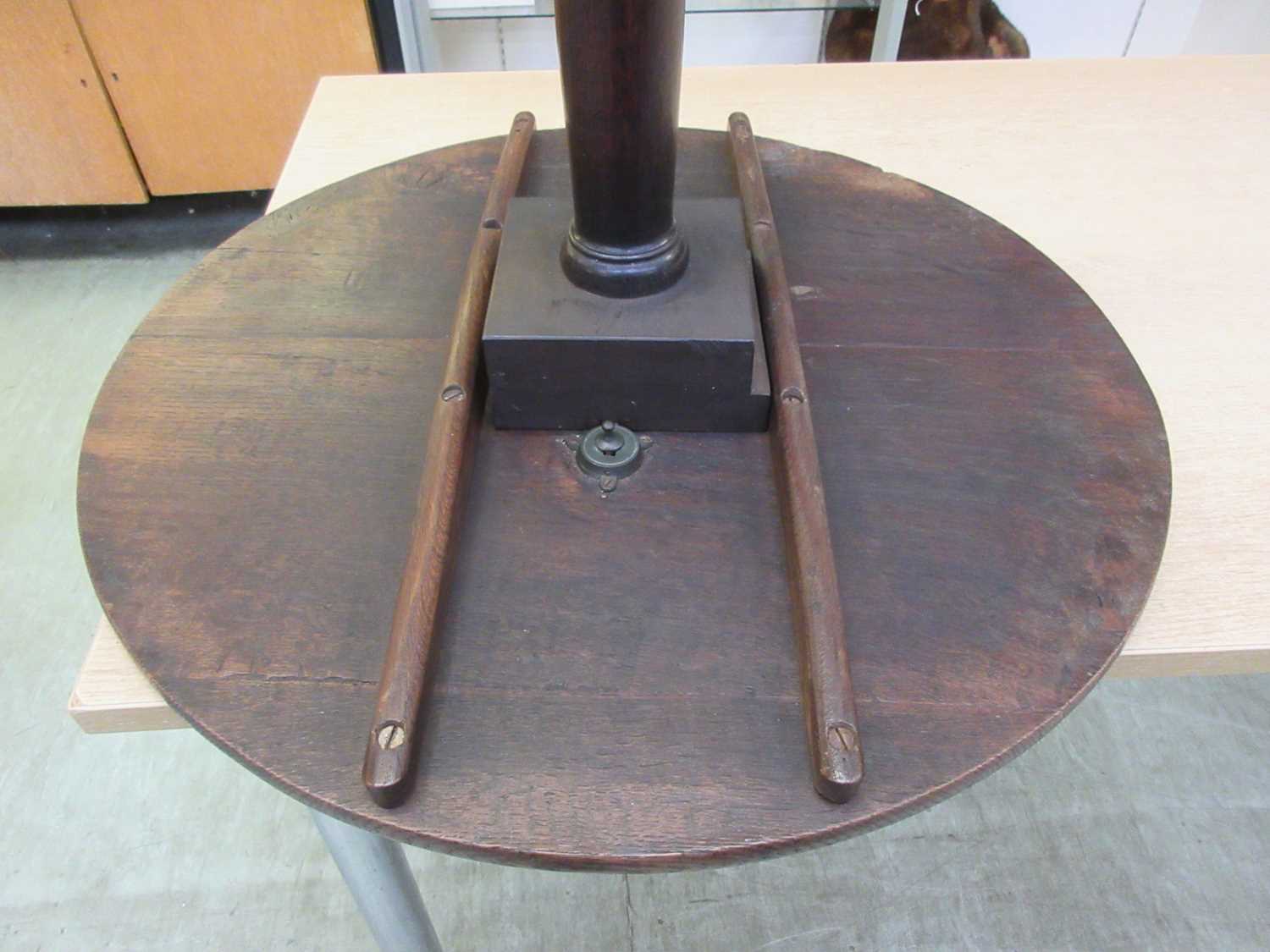 An 18th century oak tilt top tripod table, the circular top on a turned column on three splay - Image 5 of 11