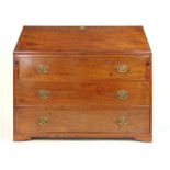 A late 18th mahogany bureau, the fall front enclosing a fitted interior over three long drawers on
