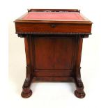 A Victorian mahogany davenport, the galleried top and writing slope with tooled leather inset