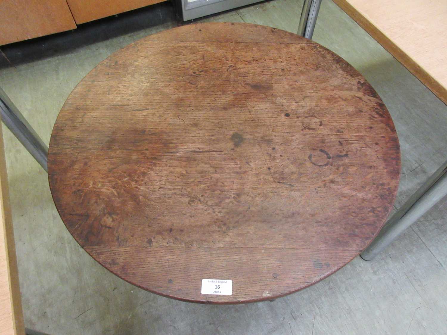 An 18th century oak tilt top tripod table, the circular top on a turned column on three splay - Image 3 of 11