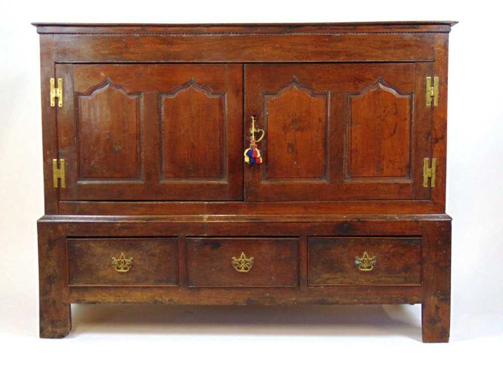 An early 18th century and later oak cabinet, the top over two twin arch top field panel doors - Image 2 of 2