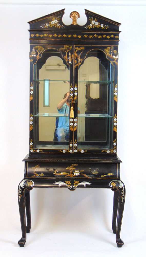 A 20th century Chinese black lacquer display cabinet, the broken arch pediment over two glazed doors - Image 2 of 2