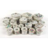 A collection of nineteen 19th and early 20th century Chinese circular lidded pots