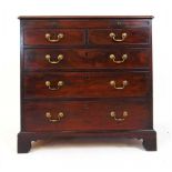 An 18th century mahogany chest of two short over three long drawers, the banded top over the