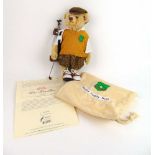 Steiff - a blonde Golfer Teddy Bear in bag, limited edition 01869/3000, with certificate, 32 cm