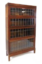 A Globe Wernicke stacking oak bookcase, with lead glazed doors, with applied label, 'Globe Wernicke,