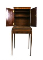 A 19th century mahogany and rosewood ladies bonheur du jour with cabinet, the boxwood and ebony