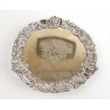 A George III silver card tray, the ornate decorative border featuring masks. The centre with