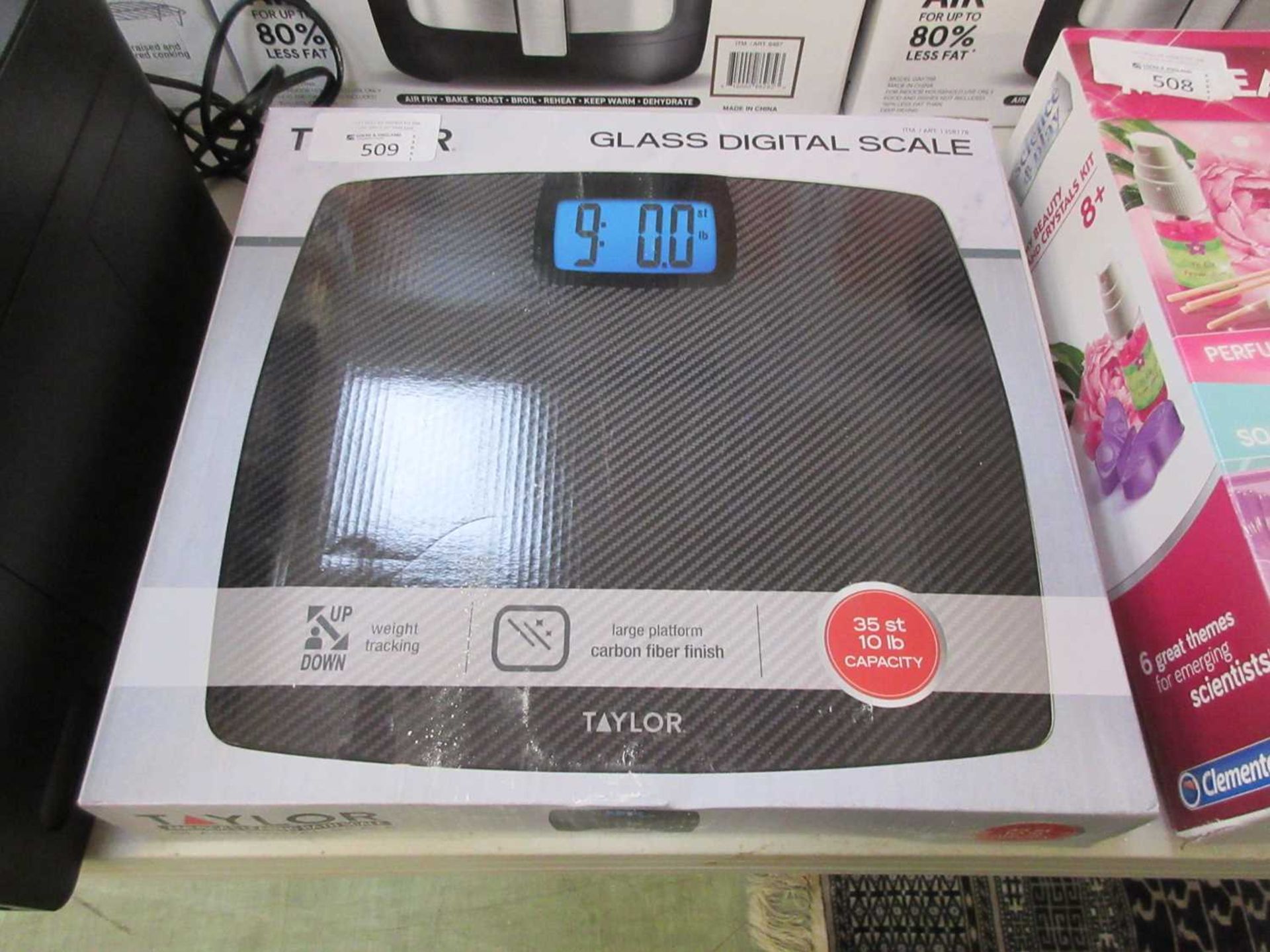 +VAT A set of boxed glass digital scales