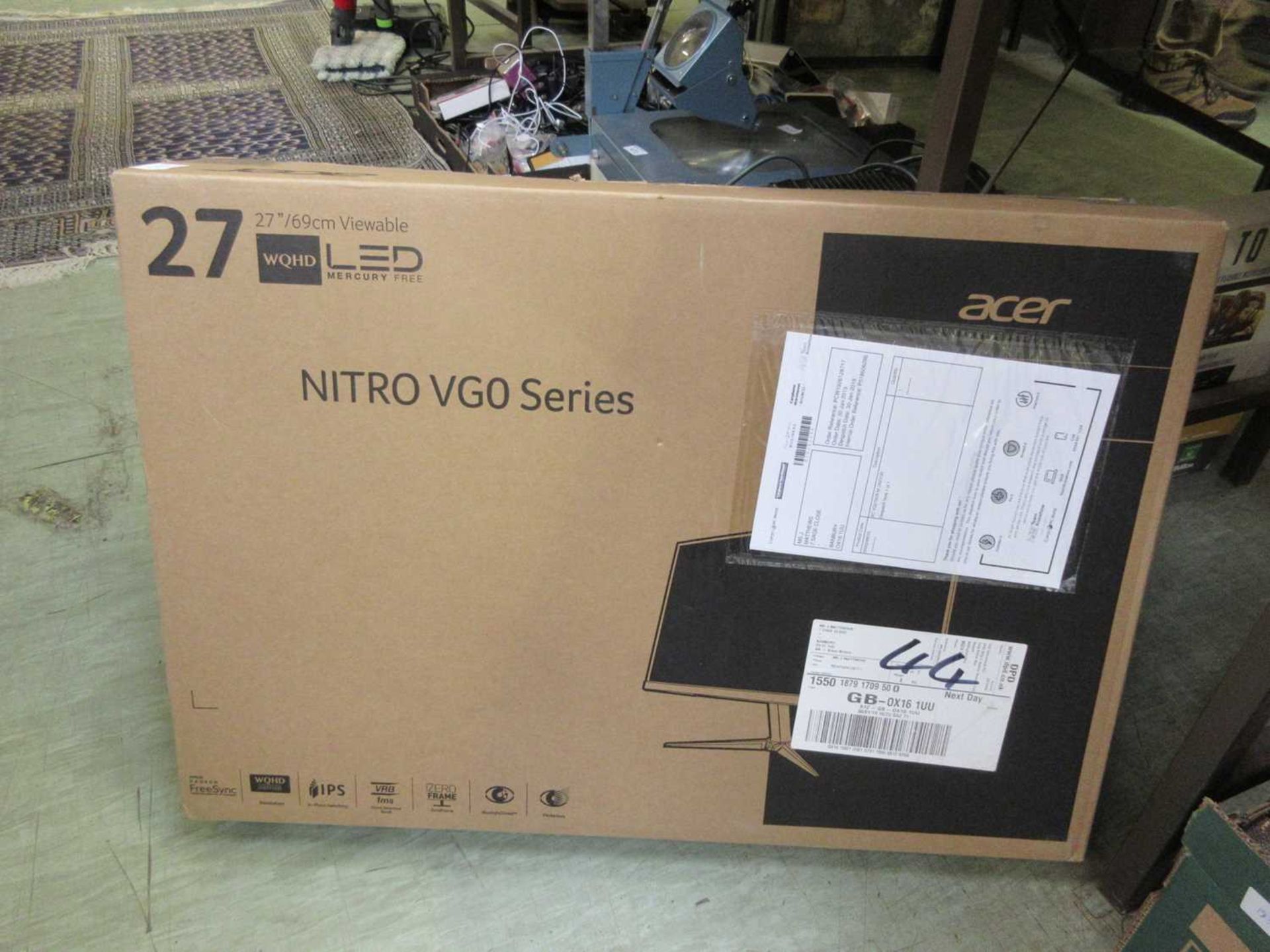 A boxed Acer 27inch computer monitor