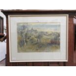 A framed and glazed watercolour of countryside scene signed bottom left