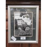 A framed and glazed artwork of a bridge over the river Leam