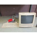 An Apple Mcintosh LC computer