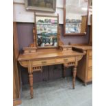 A late 19th century ash dressing table, the mirror with trinket drawers over two drawers on turned