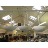 A set of three white painted ceiling hanging lights
