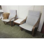 A pair of bent wood open armchairs with matching footstool