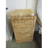 A wicker laundry basket