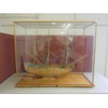 A glass cased model of the sailing vessel 'The Royal Louis' from 1780