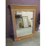 A modern oak framed mirror