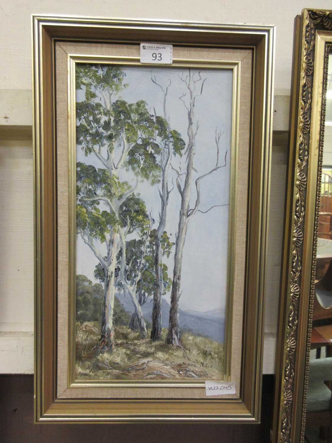 A framed oil on board of trees signed Kerric Miller