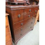 A mid-20th century chest having an assortment of two short flanked by two hat drawers above three