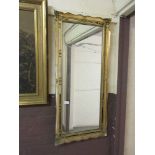 A rectangular gilt framed mirror