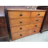 A late Victorian mahogany chest of two short over three long drawers