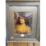 An early 20th century oak framed print of young lady