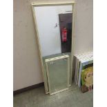 Two white framed mirrors