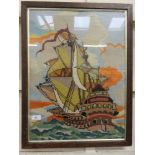 An oak framed and glazed needlework of galleon