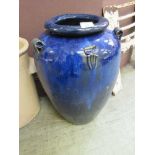 A blue glazed garden pot