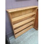 A waxed pine bookcaseKnocks and scratches throughout, no major damages apparent. Dimensions: H,