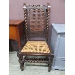 A 19th century walnut single chair with caned back and seat, barley twist back supports and