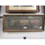 A framed and glazed display of three monochrome prints depicting buildings