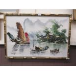 A gilt framed oil on canvas of Vietnamese sailing vessels