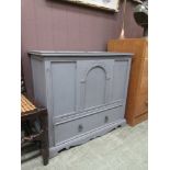 An early 20th century grey painted mule chest with Roman arch panel over single drawer
