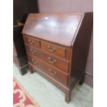 A mid-20th century Gordon Russell fall front bureau having two drawers above two long drawers