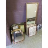 A selection of mirrors, prints, and picture frames