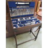 An oak cased canteen of flatware comprising of spoons, forks, knives, etc