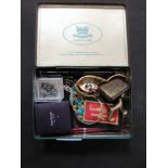 A tin containing an assortment of items to include costume jewellery, watches, etc