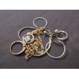 A small quantity of yellow metal and white metal jewellery to include chains, rings, etc