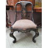 A 19th century ebonized and floral painted bedroom chair on cabriole legs A/F