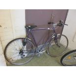 A Rotrax Cycles purple gentleman's bicycle with saddle, pedals, and frame