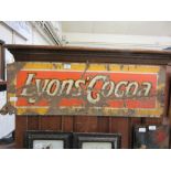 An early 20th century Lyon's Cocoa advertising enamel sign