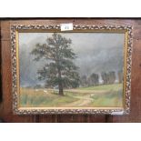 A gilt framed oil on canvas of country lane scene signed Recchion